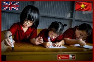 3 young Vietnamese girls studying